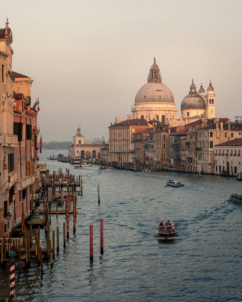 Stunning sunset view of the iconic Grand Canal in Venice with Santa Maria della Salute.