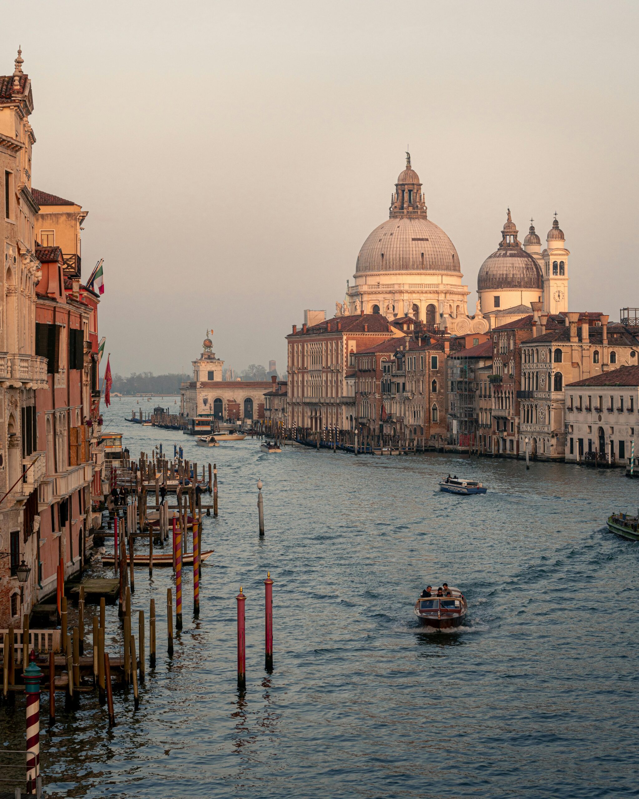 Stunning sunset view of the iconic Grand Canal in Venice with Santa Maria della Salute.