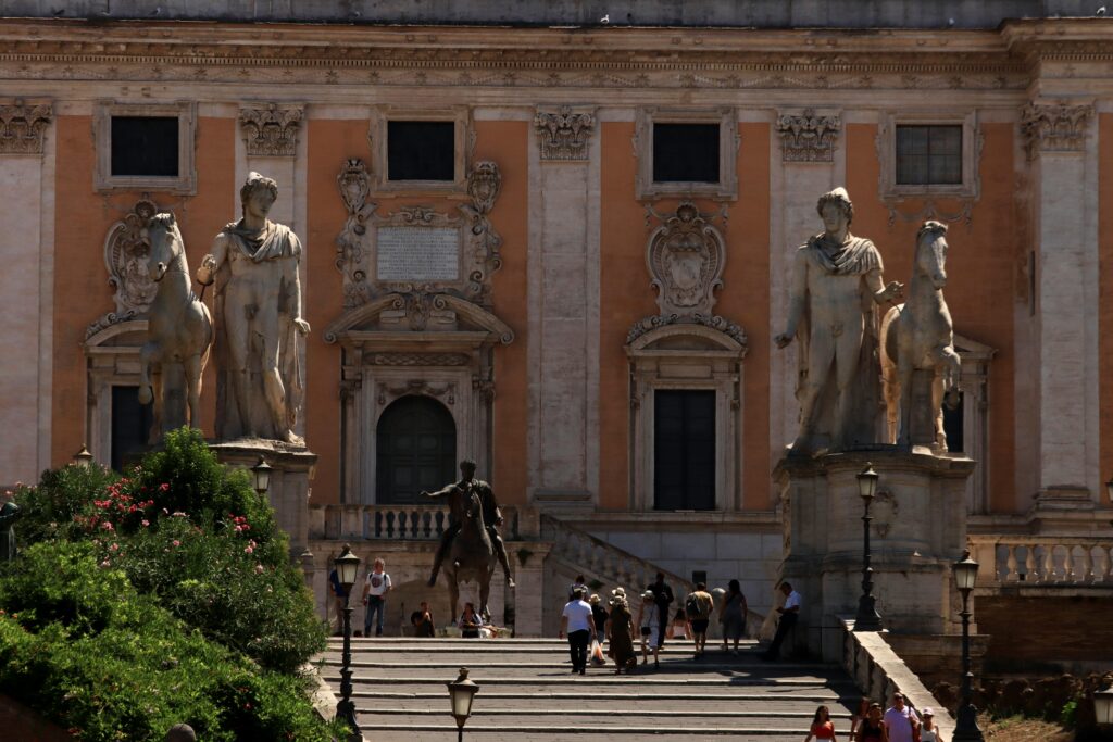 A view of the Senatorial Palace in Rome showcasing stunning Renaissance architecture and statues.