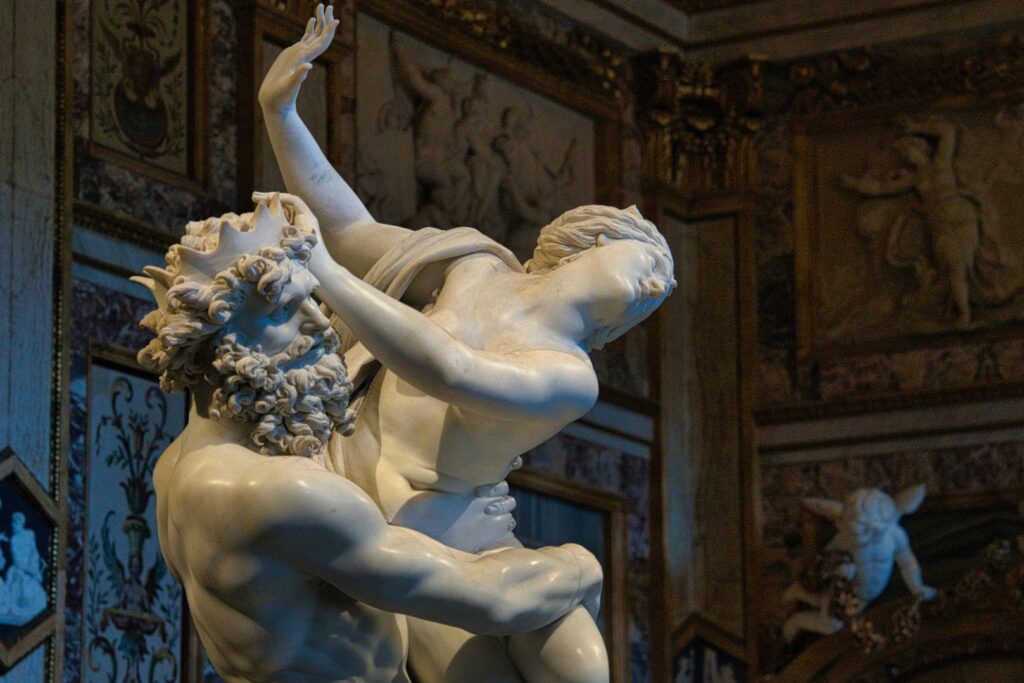 Intricate marble sculpture by Bernini in Rome, capturing mythology and artistry.