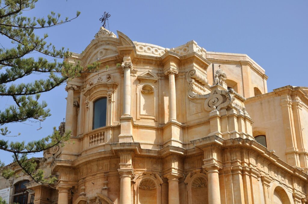 Discover stunning Baroque architecture in Noto, Sicily, showcasing intricate designs and classical elegance.