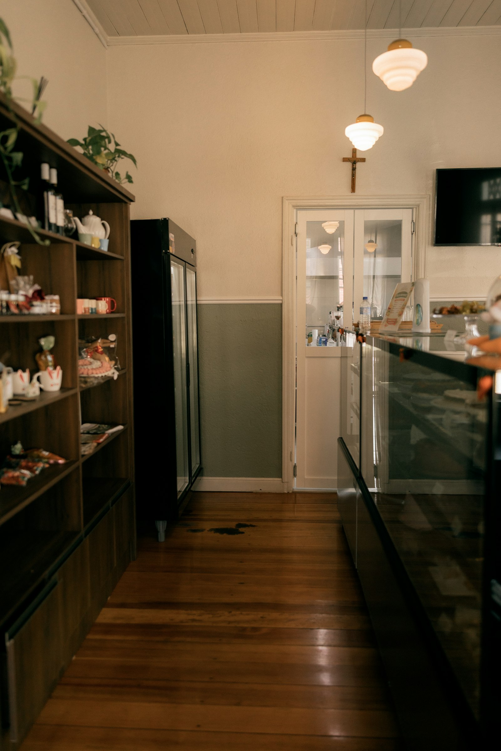 Interior of a bakery with bread and pastries in display cases