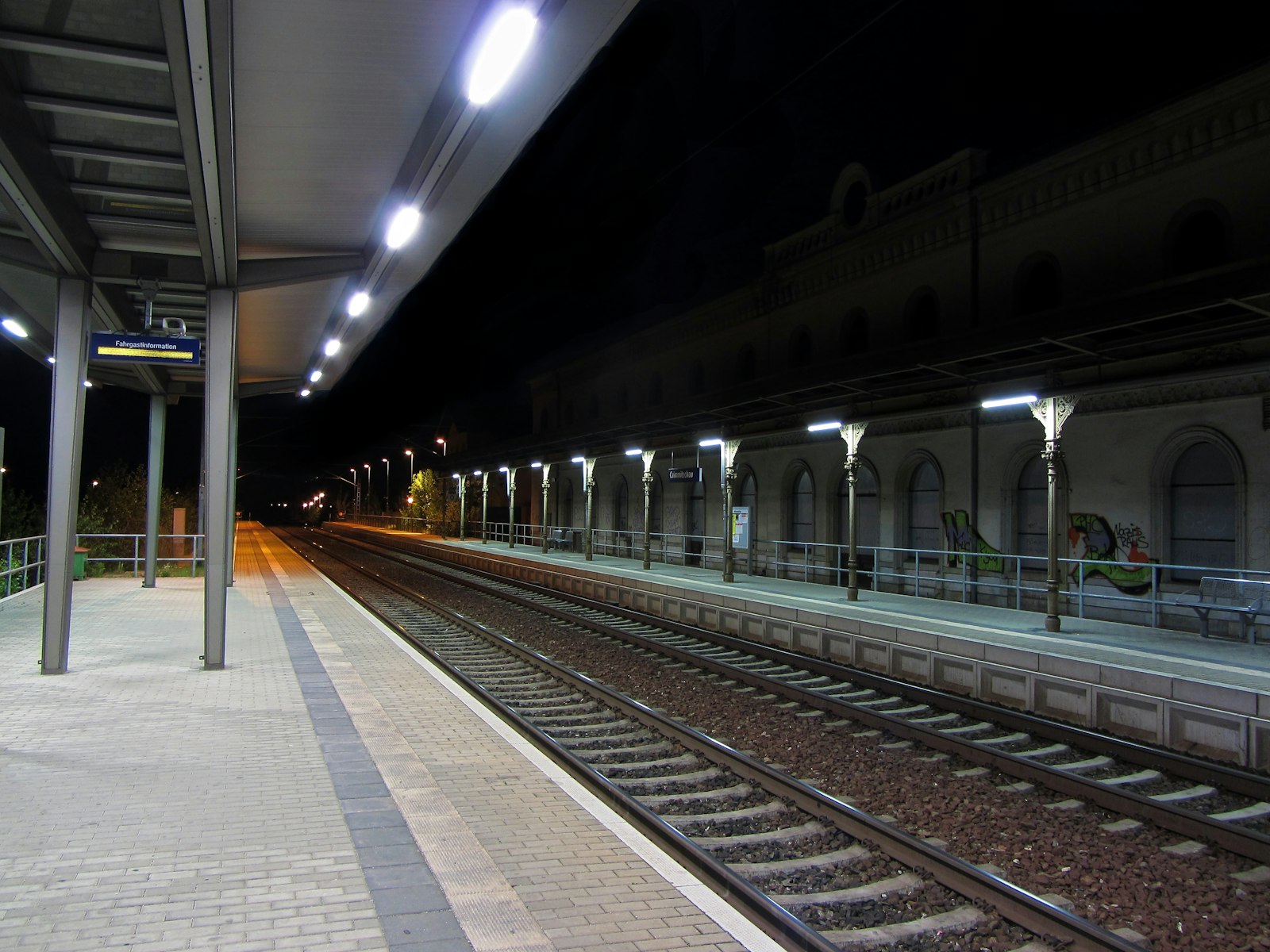 Empty station platform after a train departure