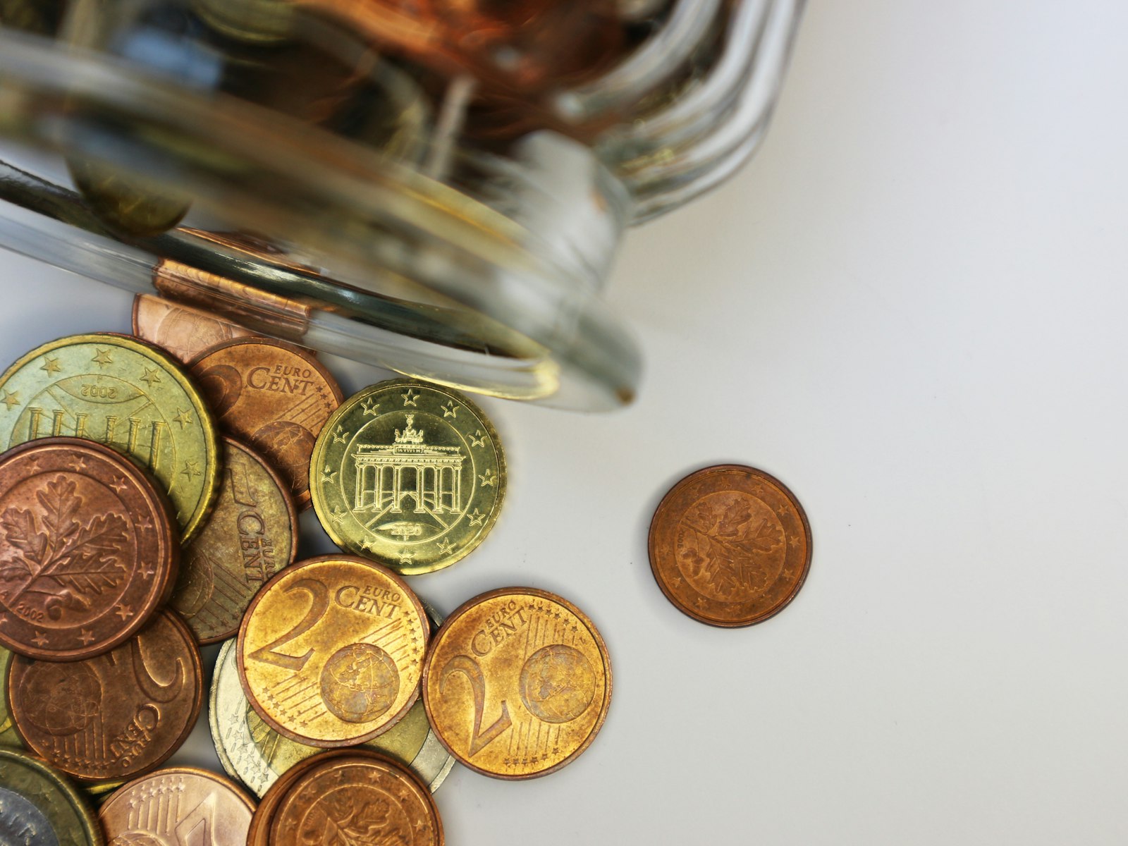 Small euro coins of the kind a bus driver can give change for