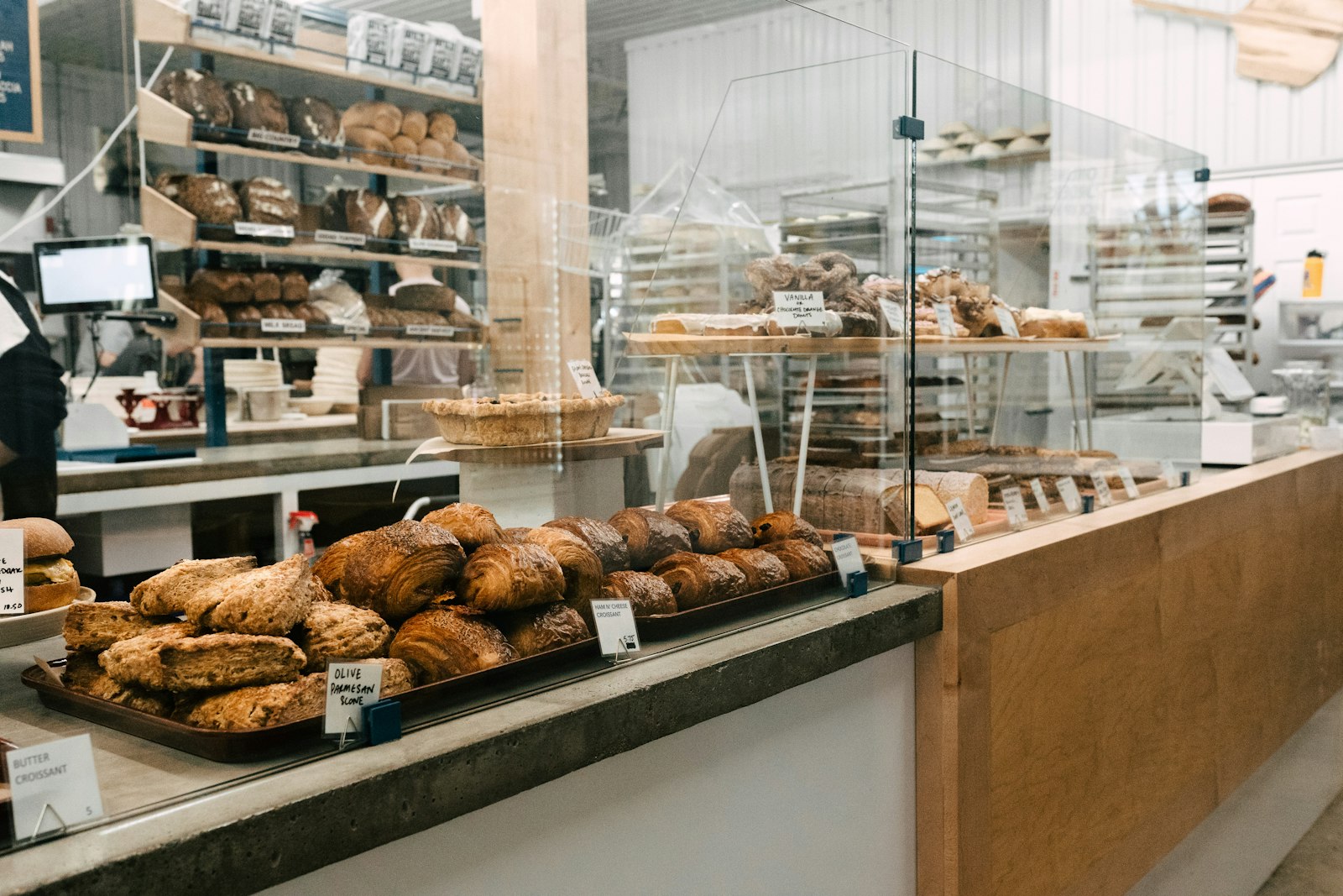 Italian bakery counter filled with fresh bread and baked goods