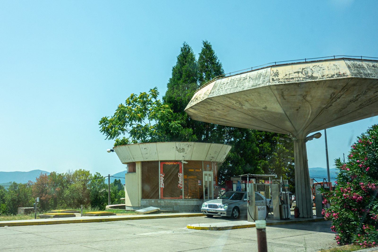 Motorway service area building with cars parked outside