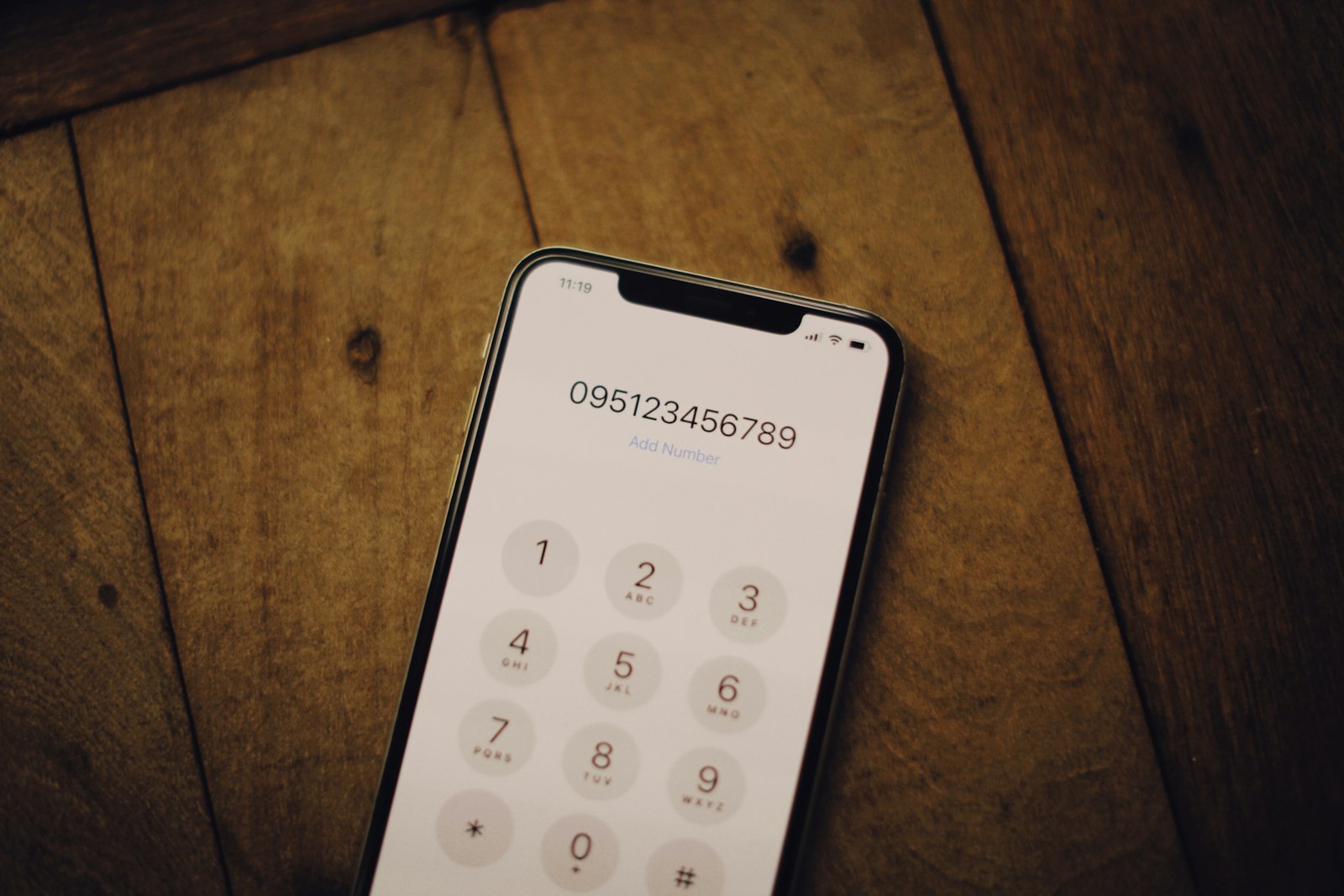 Smartphone dial pad used to enter an Italian number with the +39 country code