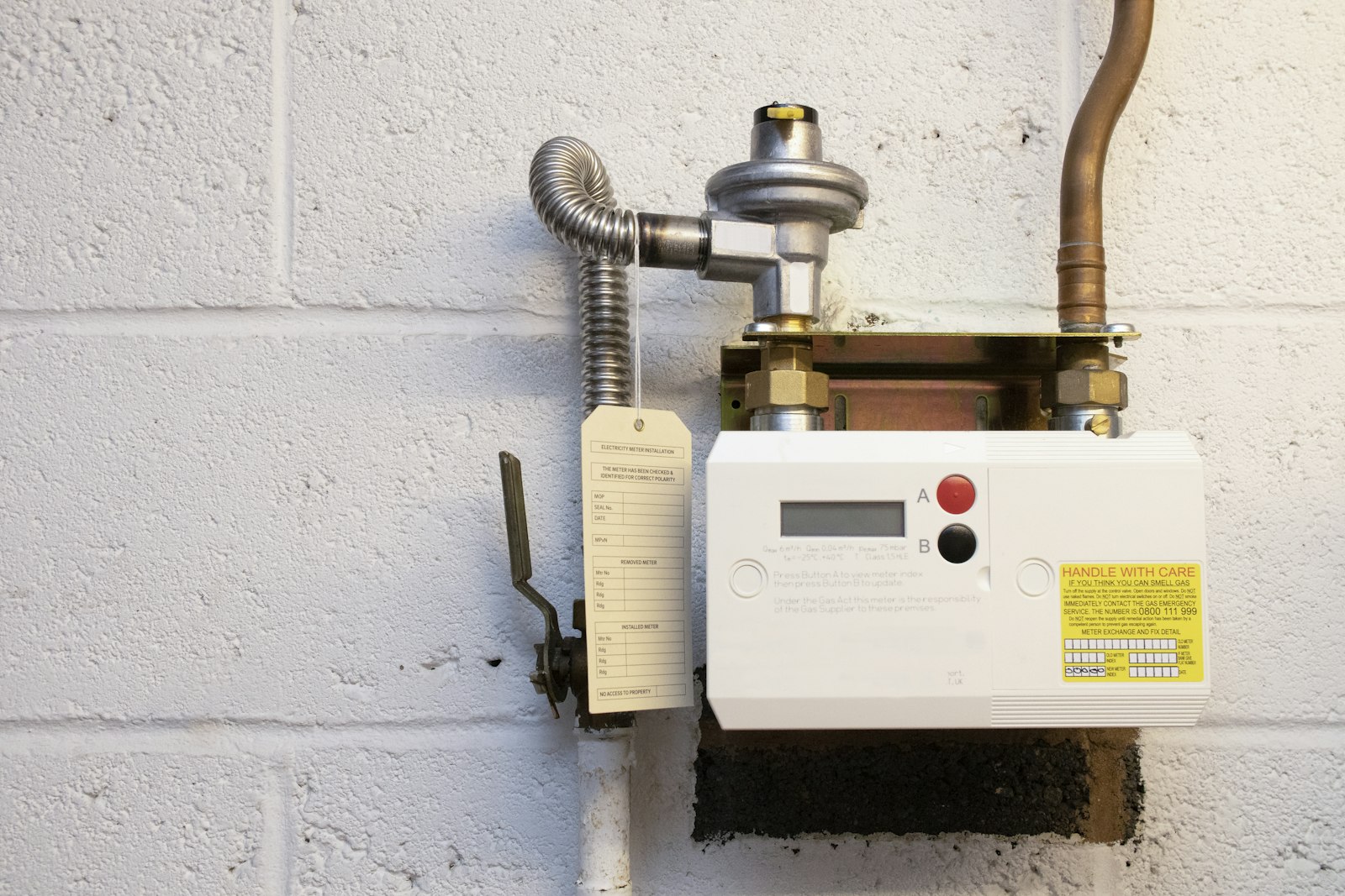 Wall-mounted boiler unit with a control panel and display