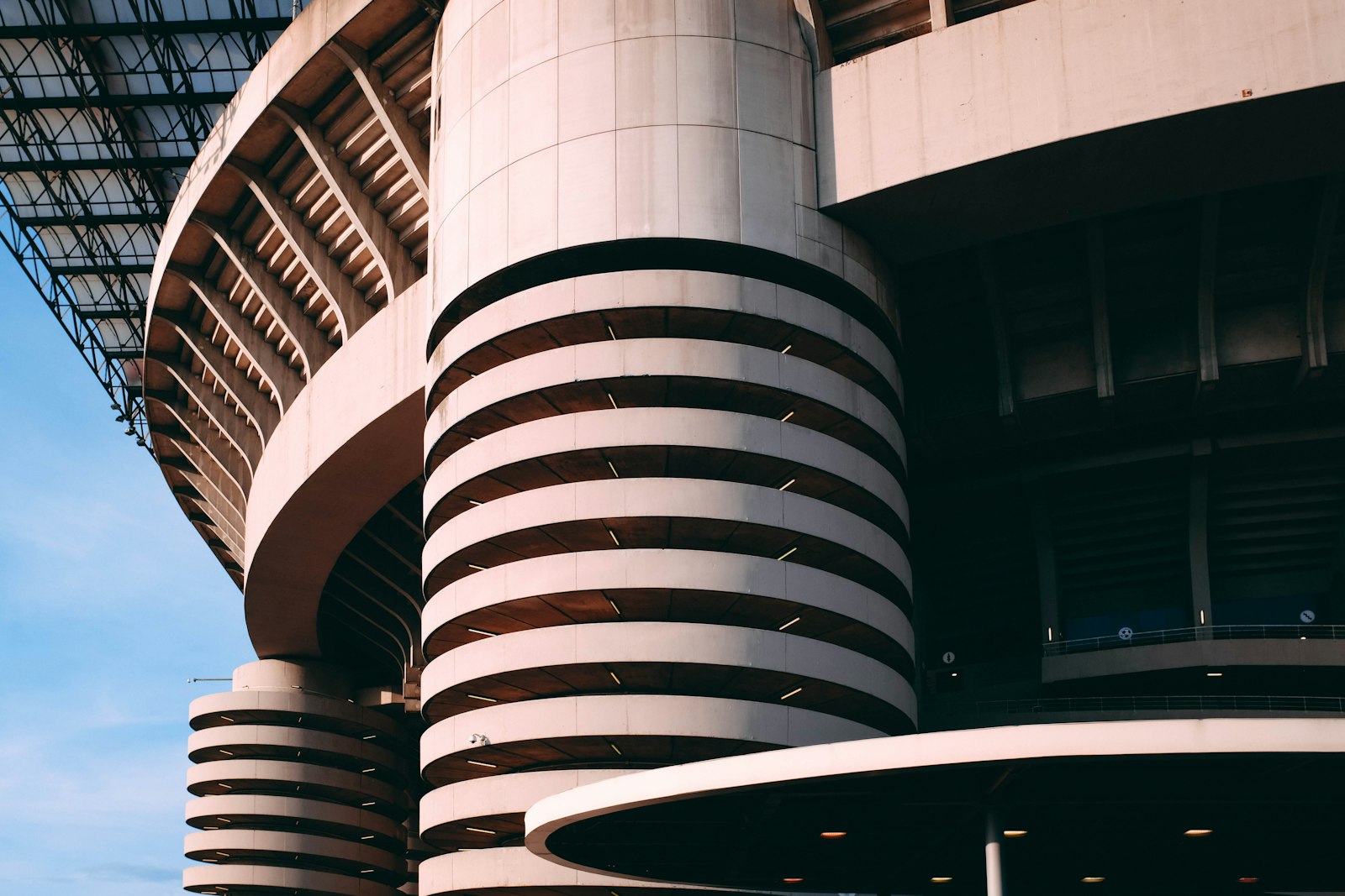 Exterior of San Siro stadium in Milan with its cylindrical spiral entrance ramp towers